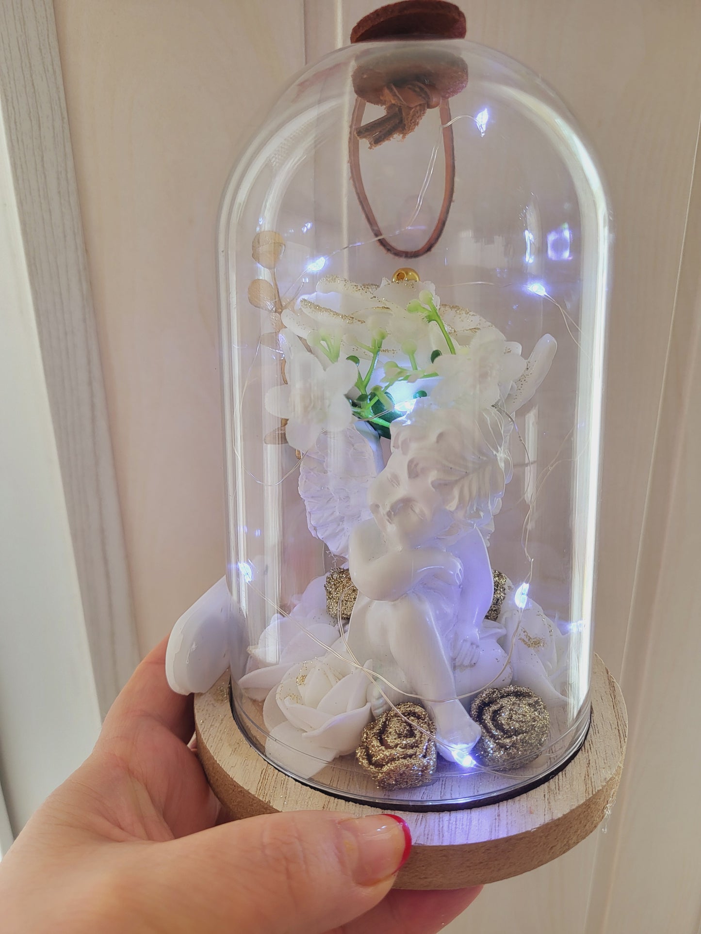Cloche avec un ange